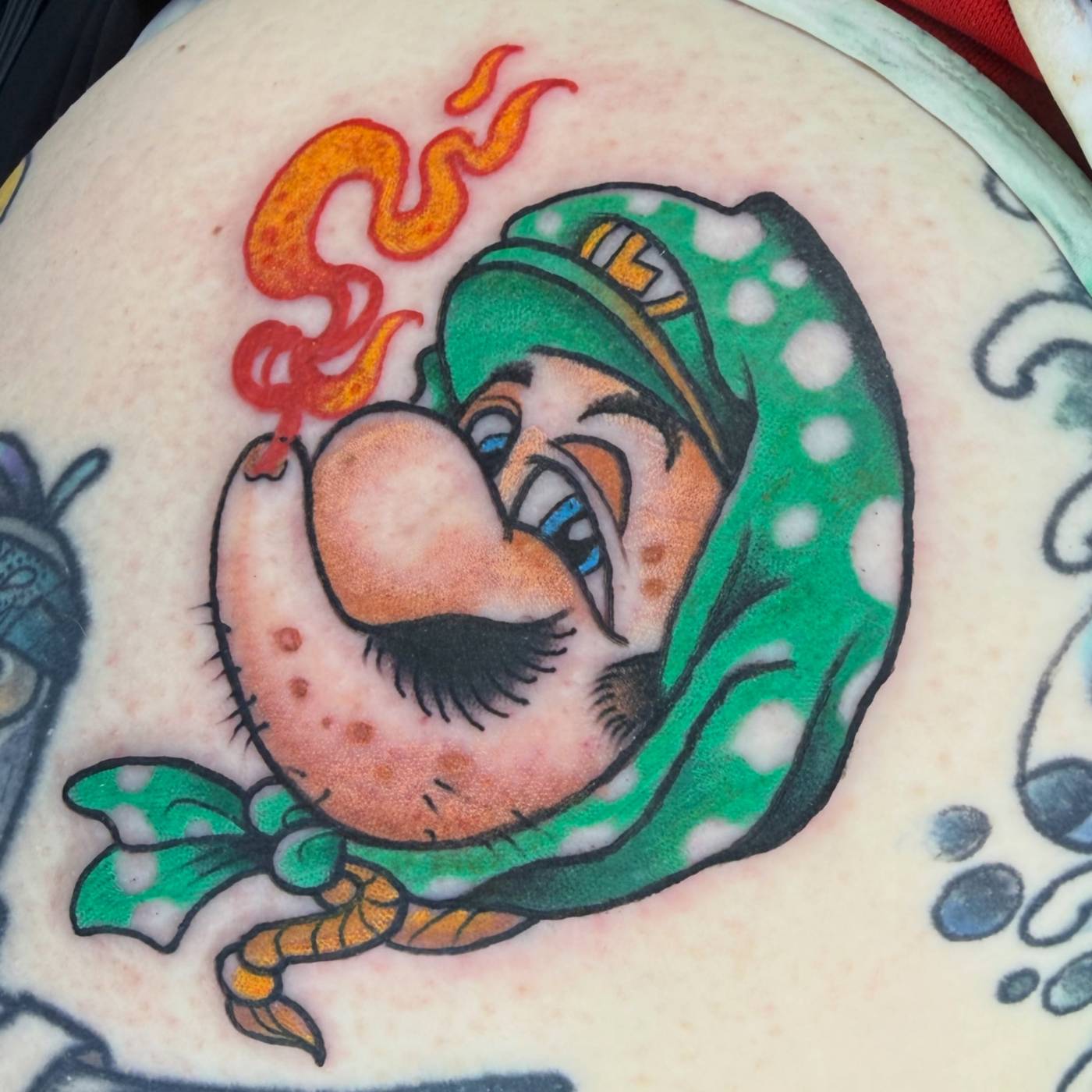 Work by Brandon Henderson on thigh
