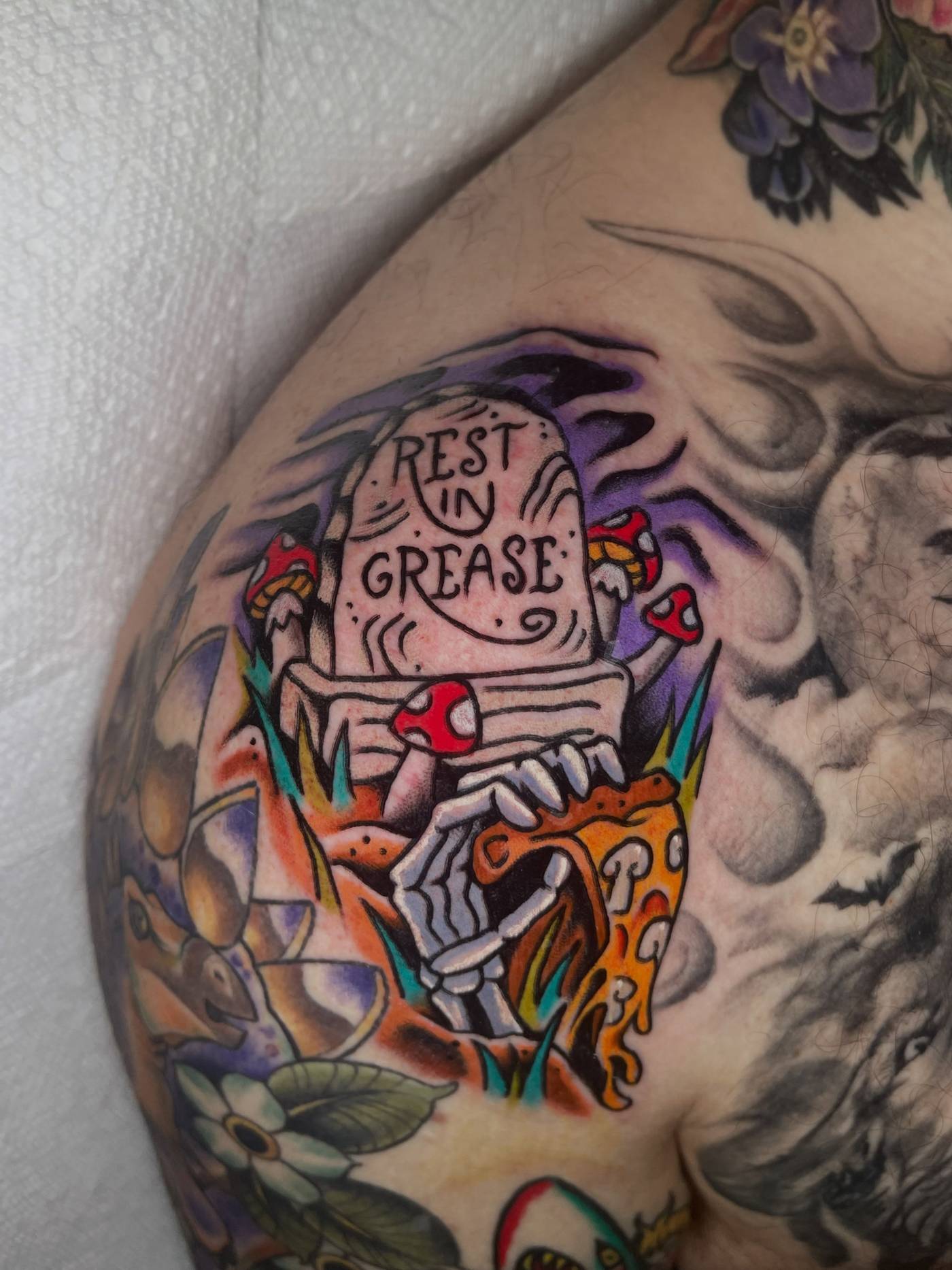 Work by Kyle Mcmeans on shoulder