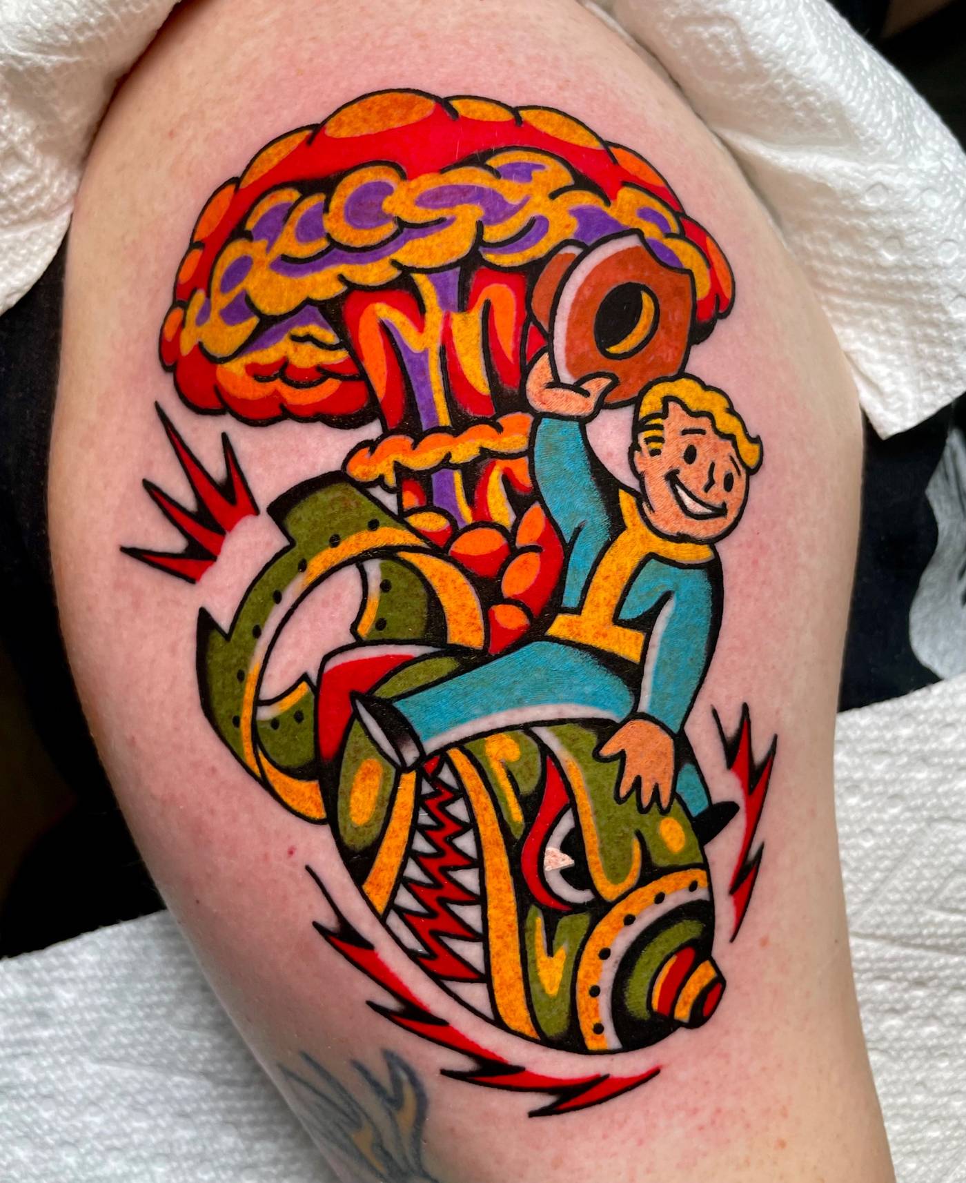 Work by Ryan McDonald on upper arm