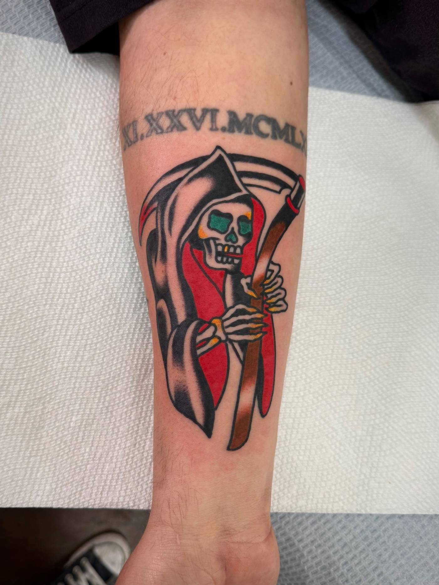 Work by Nick Mella on forearm