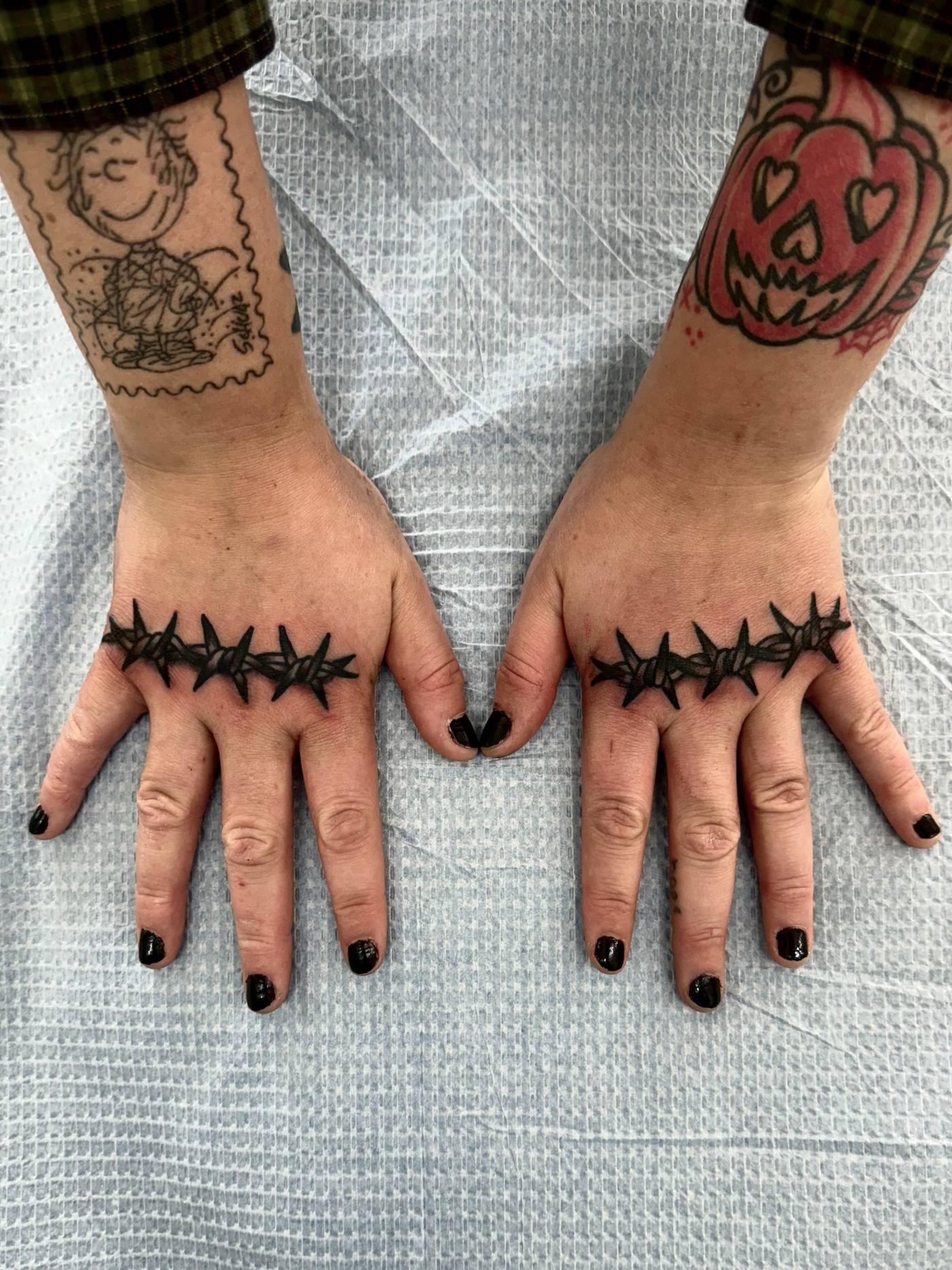 Work by Nick Mella on hand