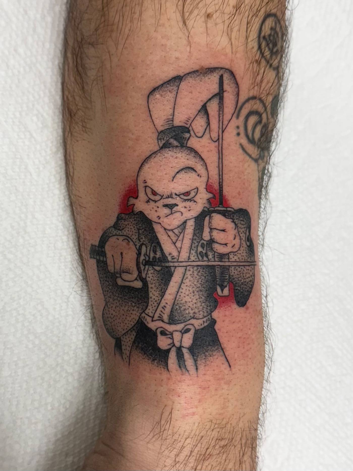 Work by Nick Mella on forearm