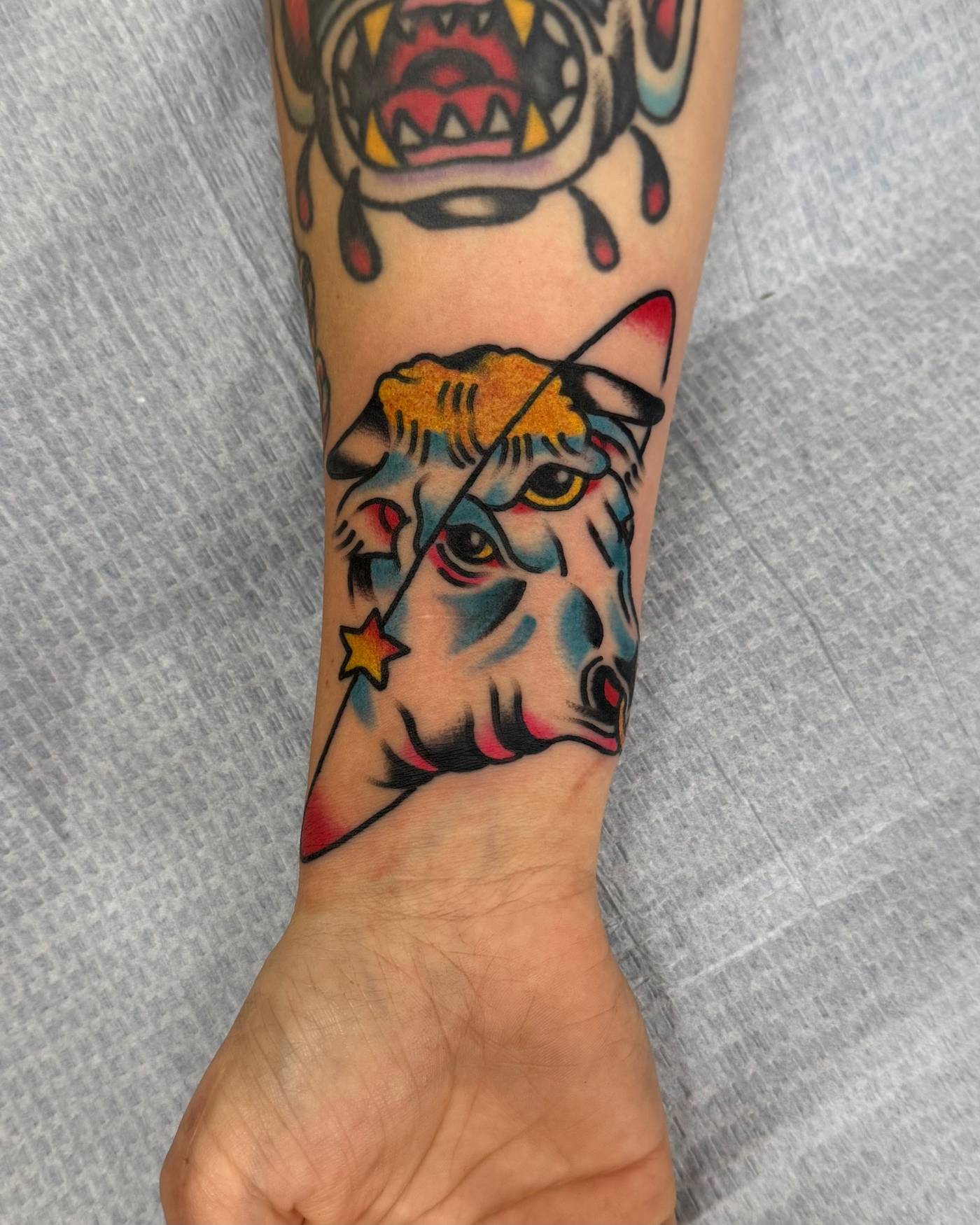 Work by Nick Mella on wrist