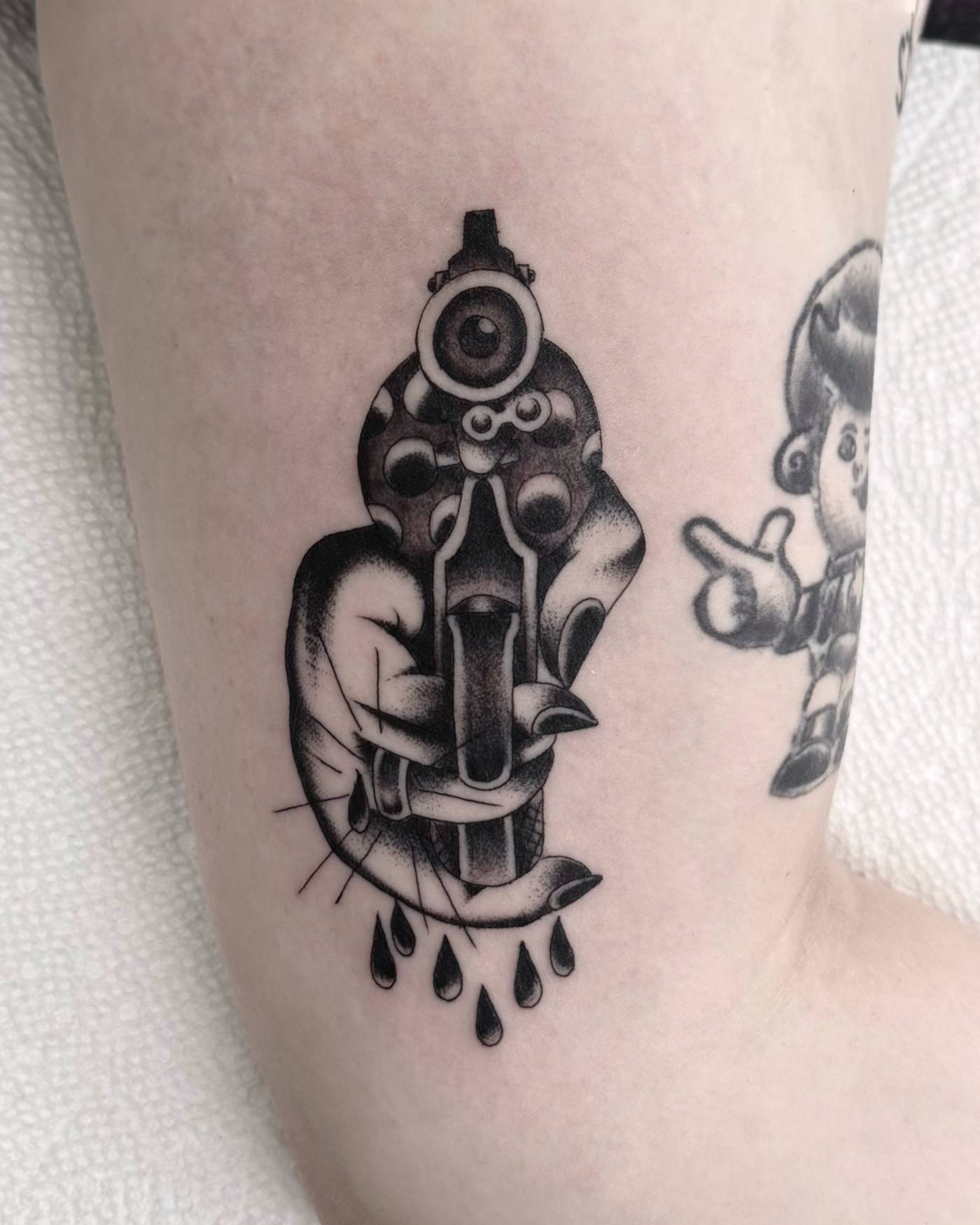 Work by Nick Mella on upper-arm